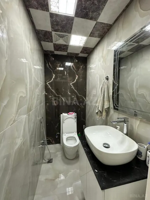 Satılır 3 otaqlı mənzil 135 m²