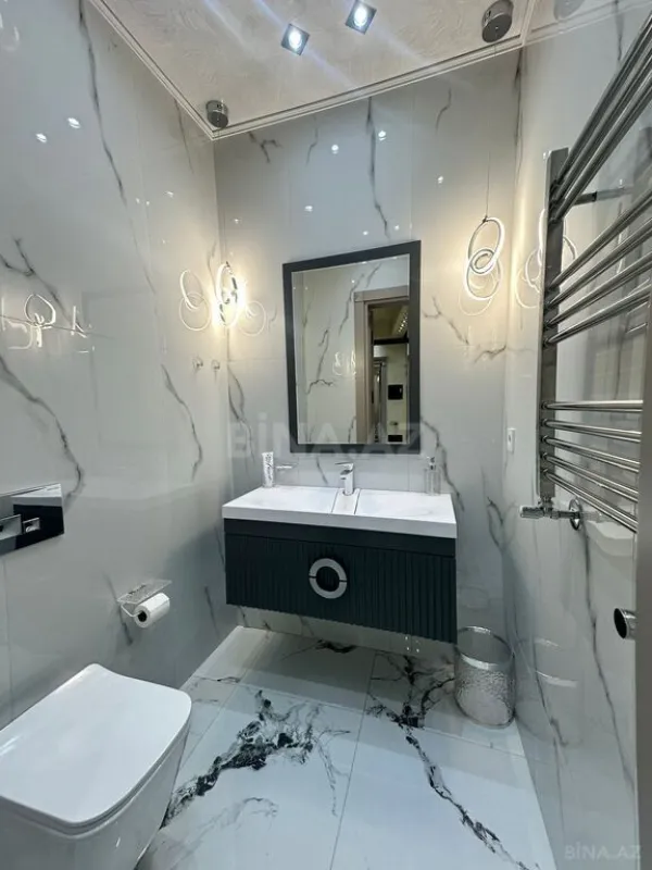 Satılır 3 otaqlı mənzil 140 m²