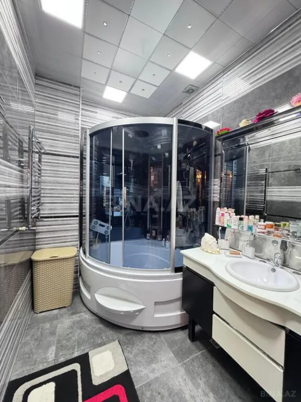 Satılır 4 otaqlı mənzil 203 m²