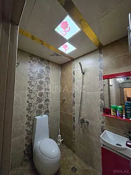 Satılır 4 otaqlı mənzil 145 m²