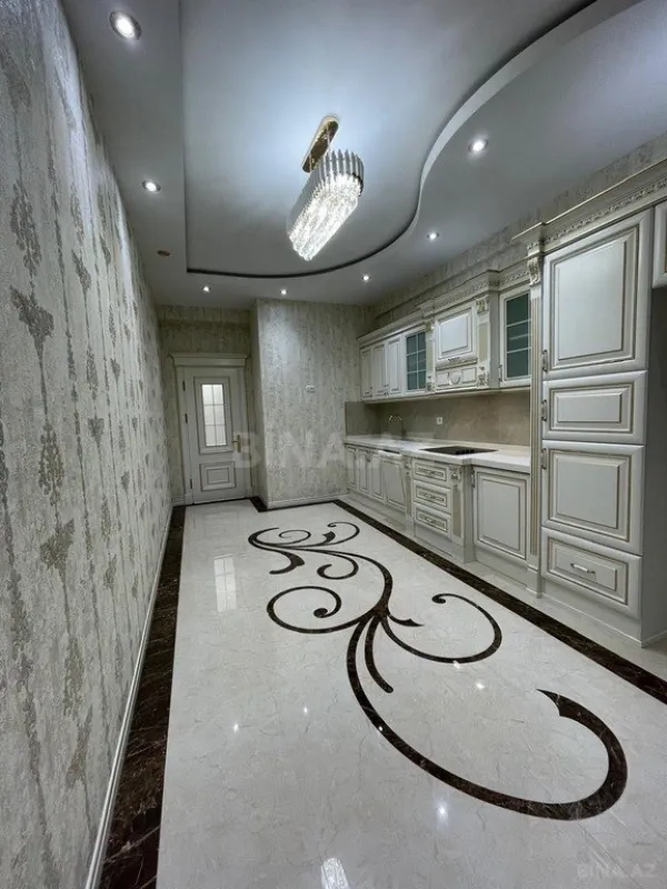 Satılır 4 otaqlı mənzil 174 m²