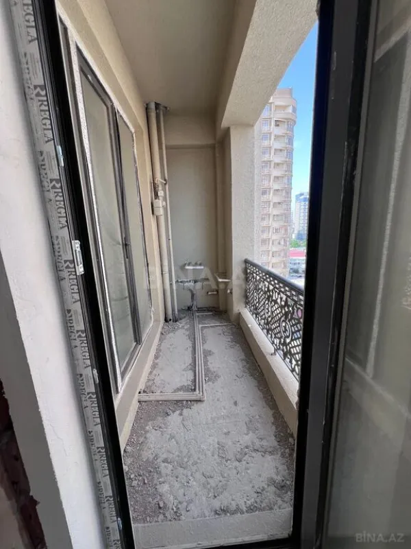 Satılır 3 otaqlı mənzil 121 m²