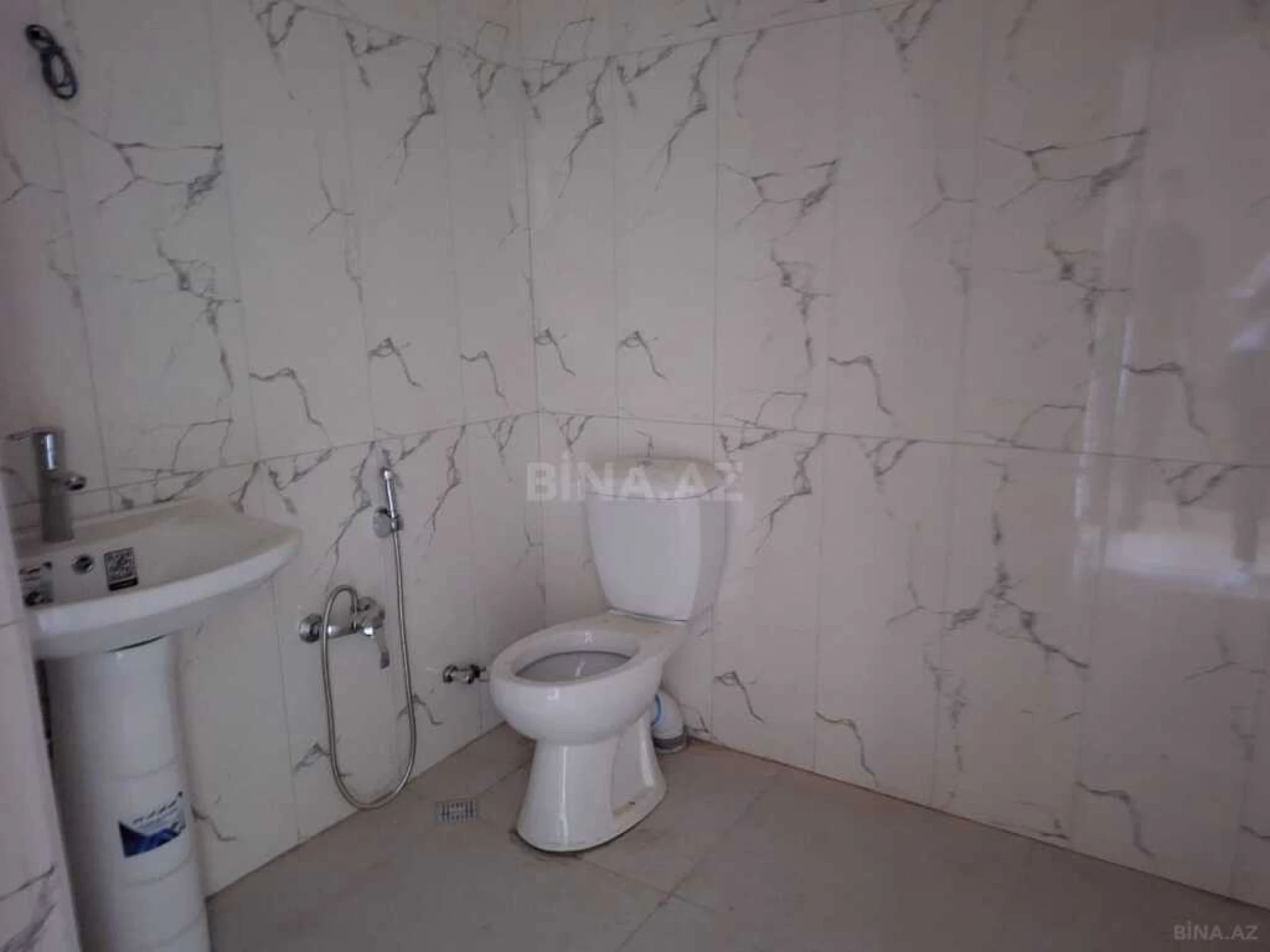 Satılır 4 otaqlı mənzil 129 m²