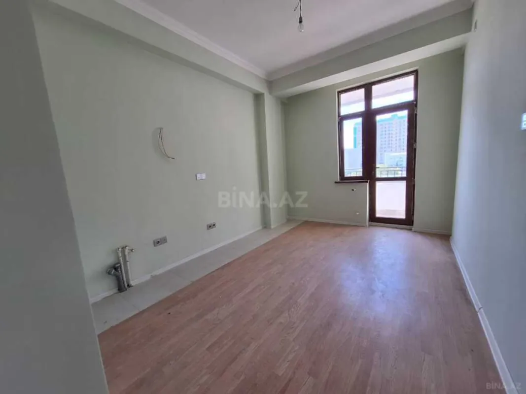 Satılır 4 otaqlı mənzil 129 m²