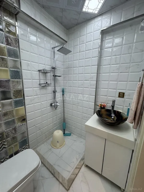 Satılır 3 otaqlı mənzil 141 m²