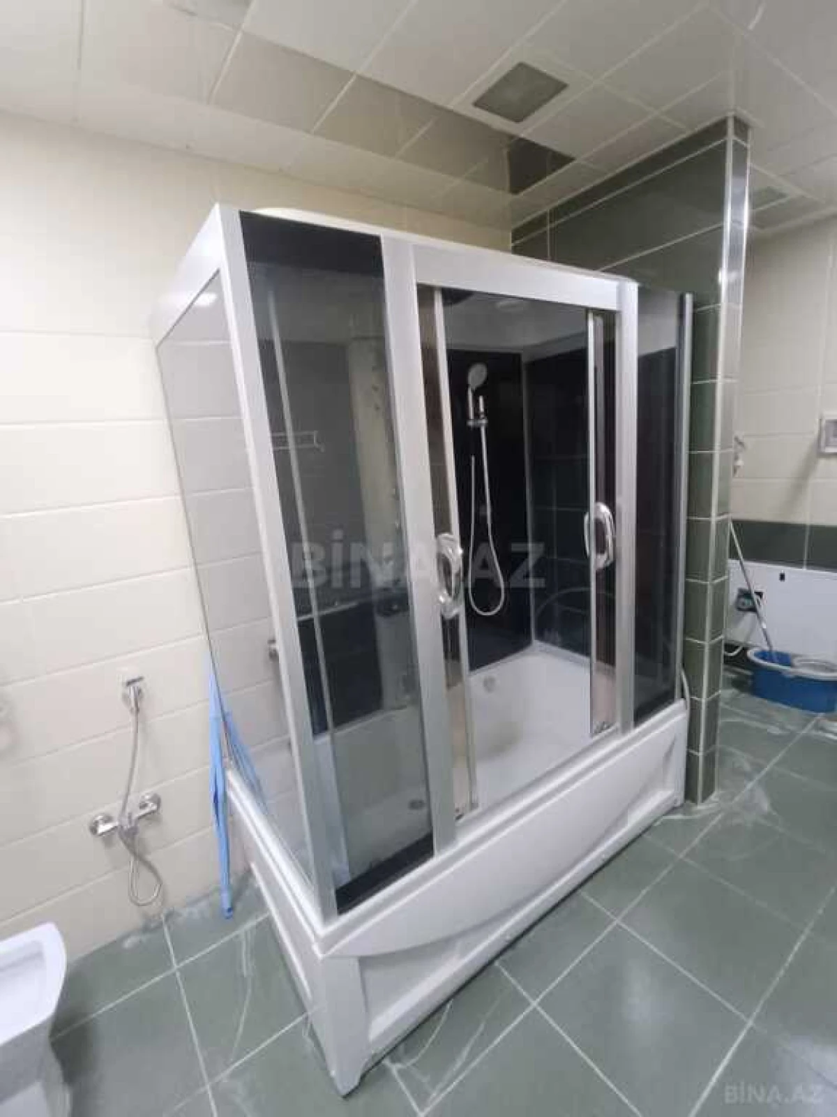 Satılır 4 otaqlı mənzil 210 m²