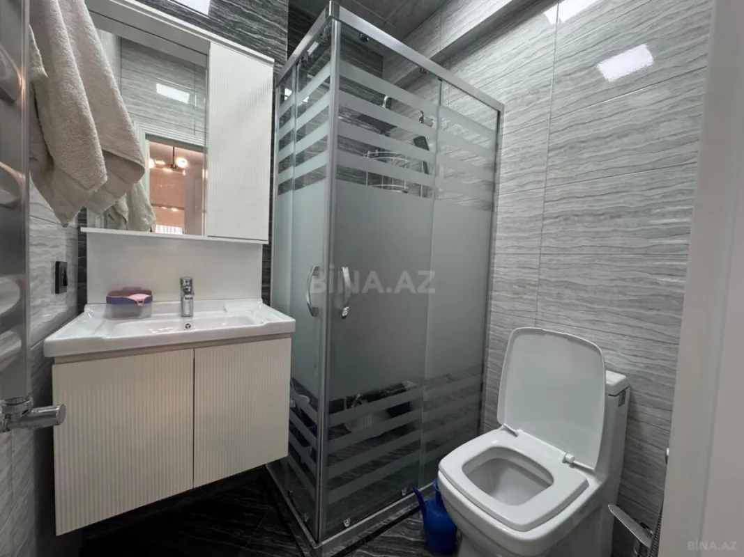 Satılır 4 otaqlı mənzil 128 m²