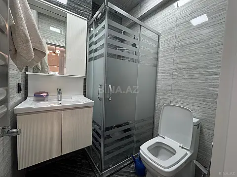 Satılır 4 otaqlı mənzil 128 m²