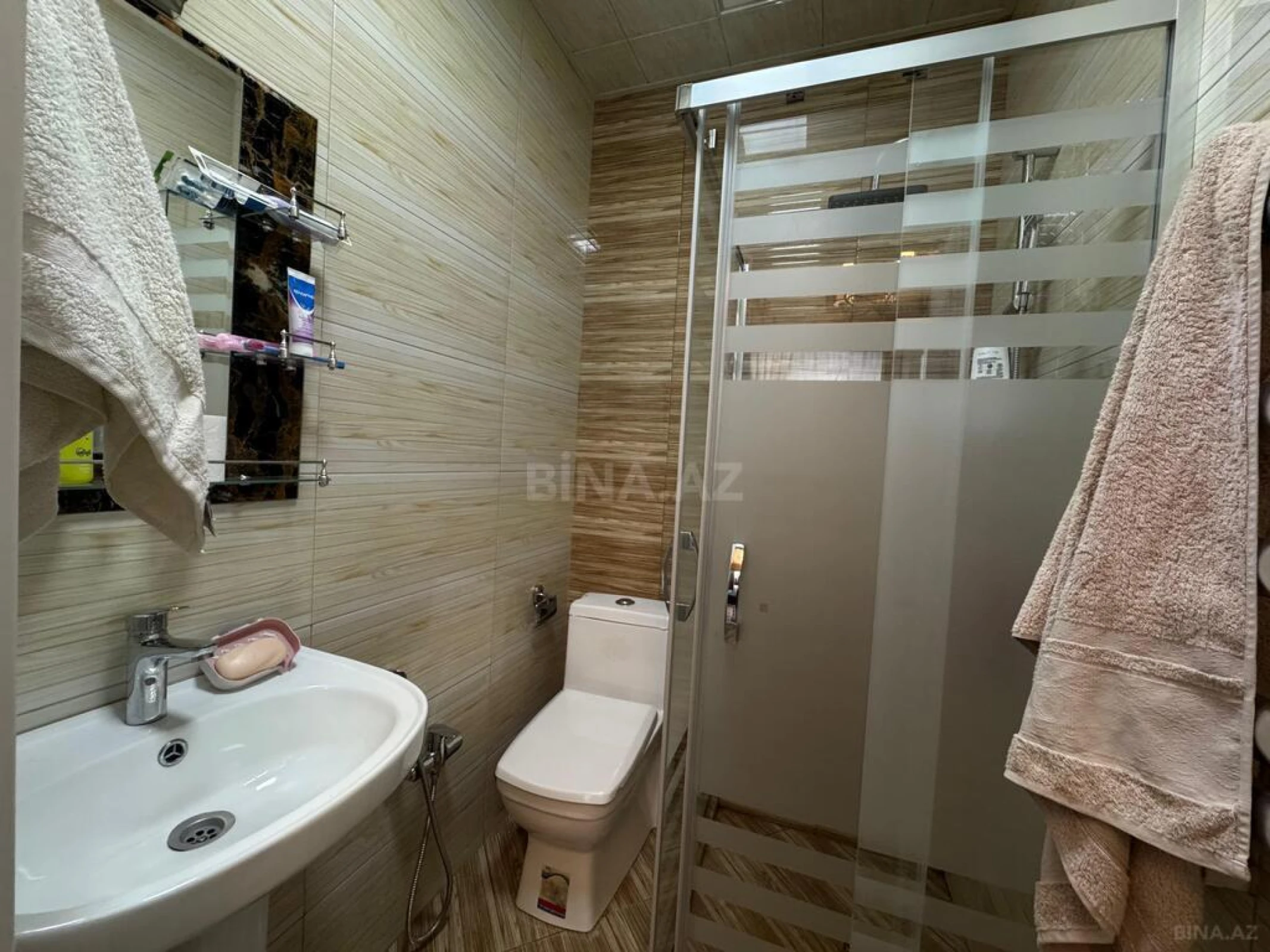 Satılır 4 otaqlı mənzil 128 m²