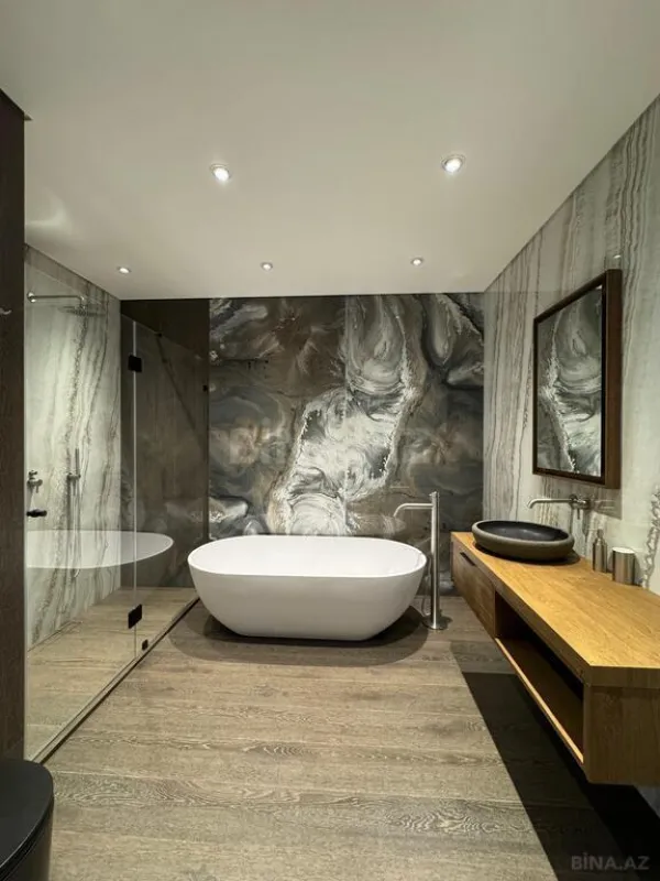 Satılır 4 otaqlı mənzil 303 m²