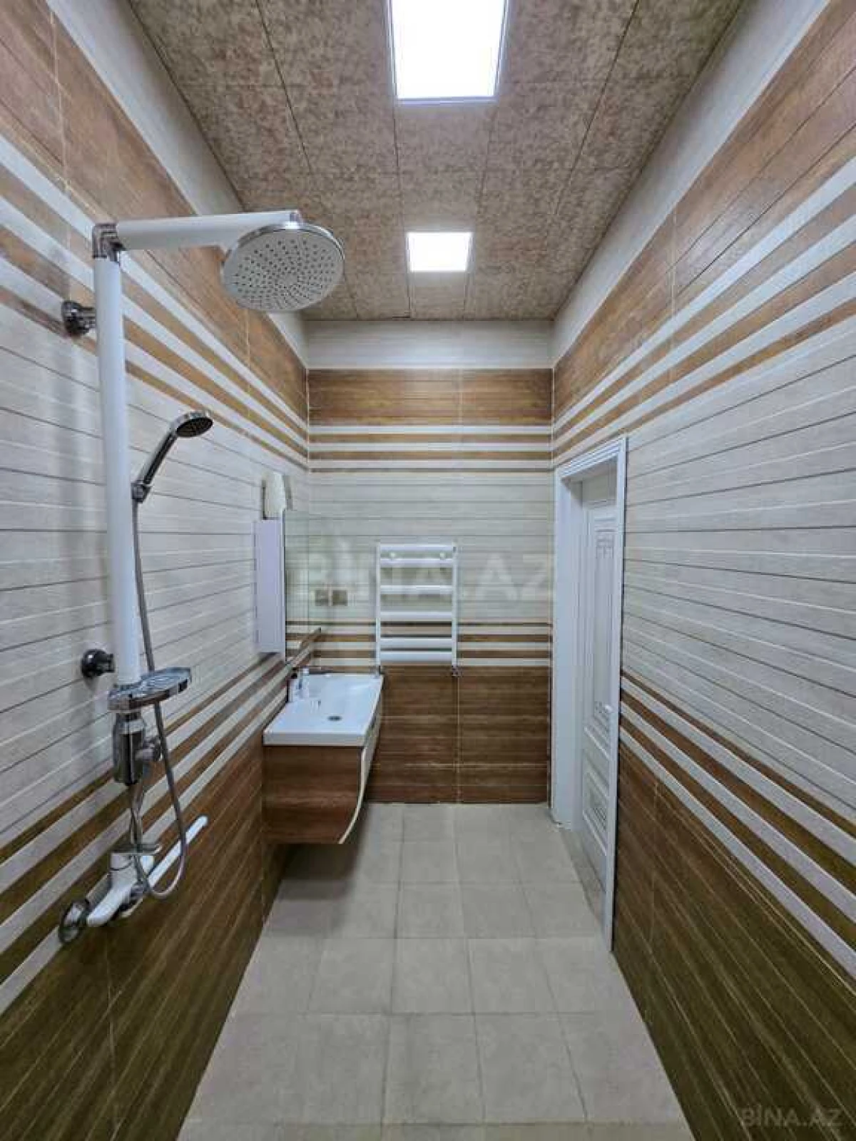 Satılır 4 otaqlı mənzil 165 m²