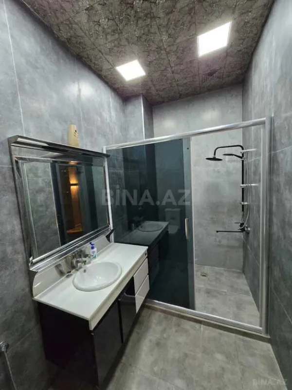 Satılır 4 otaqlı mənzil 165 m²