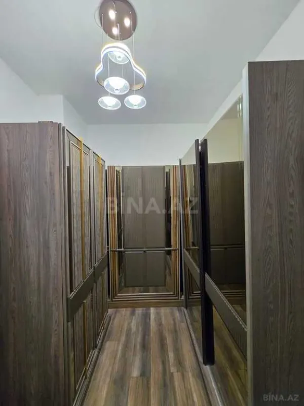 Satılır 4 otaqlı mənzil 165 m²