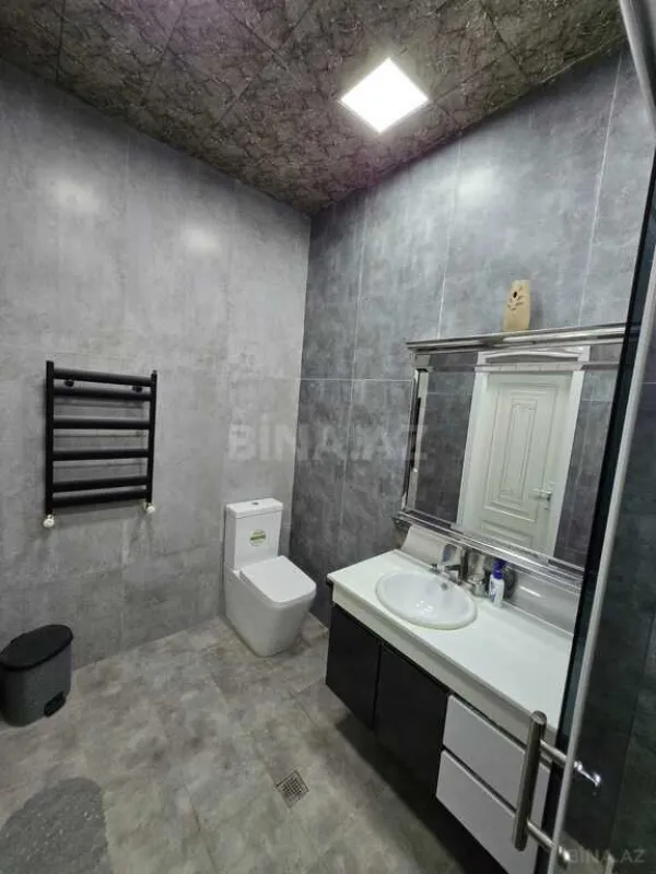 Satılır 4 otaqlı mənzil 165 m²