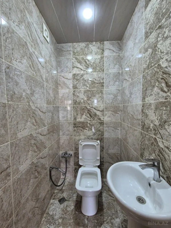 Satılır 4 otaqlı mənzil 135 m²