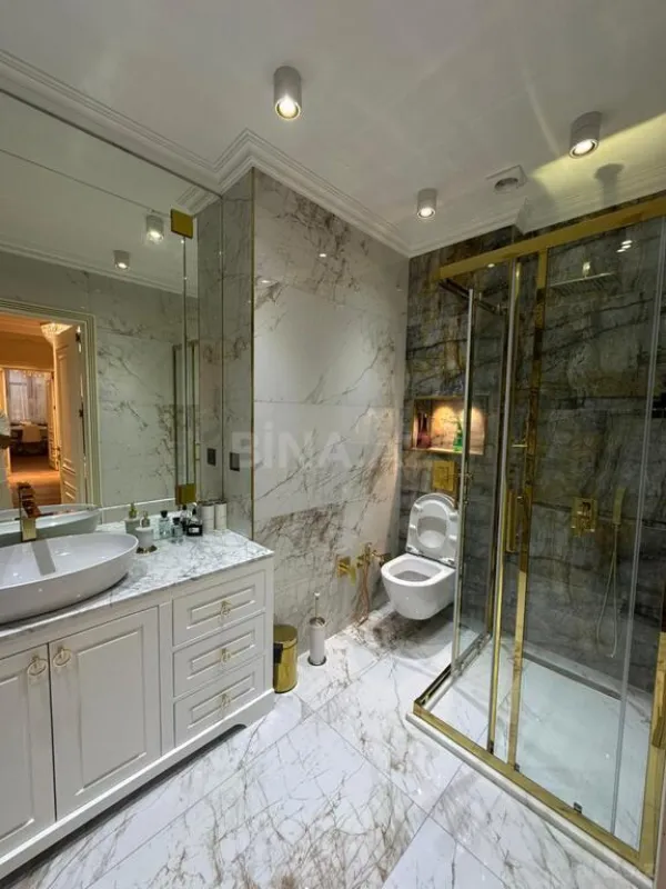 Satılır 4 otaqlı mənzil 155 m²