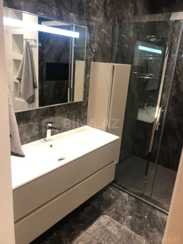 Satılır 4 otaqlı mənzil 126 m²