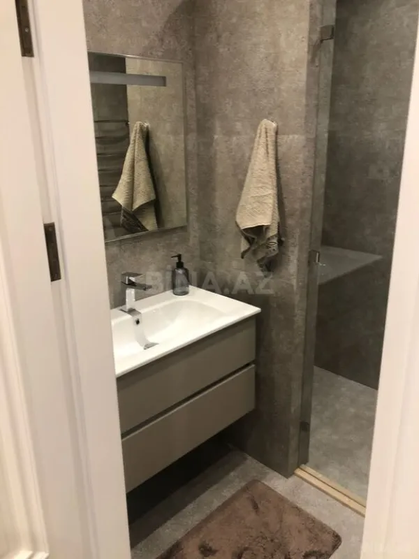 Satılır 4 otaqlı mənzil 126 m²