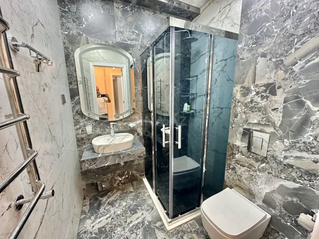 Satılır 4 otaqlı mənzil 164 m²