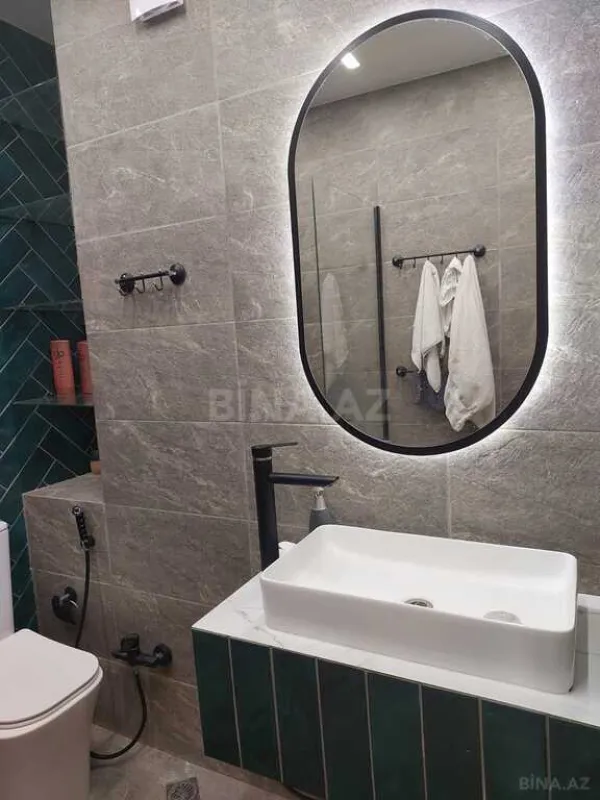 Satılır 4 otaqlı mənzil 100 m²