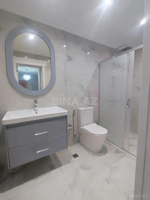 Satılır 4 otaqlı mənzil 130 m²