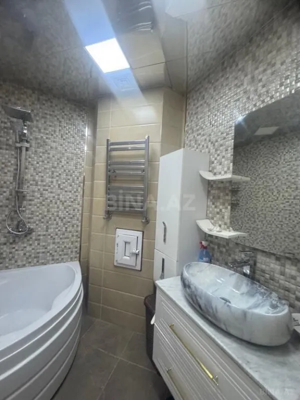 Satılır 4 otaqlı mənzil 100 m²