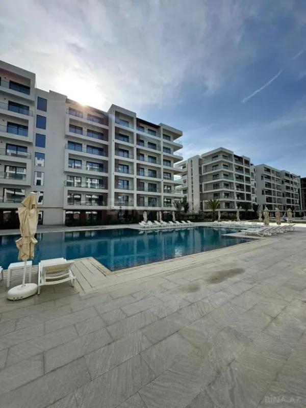 Satılır 1 otaqlı mənzil 56.9 m²