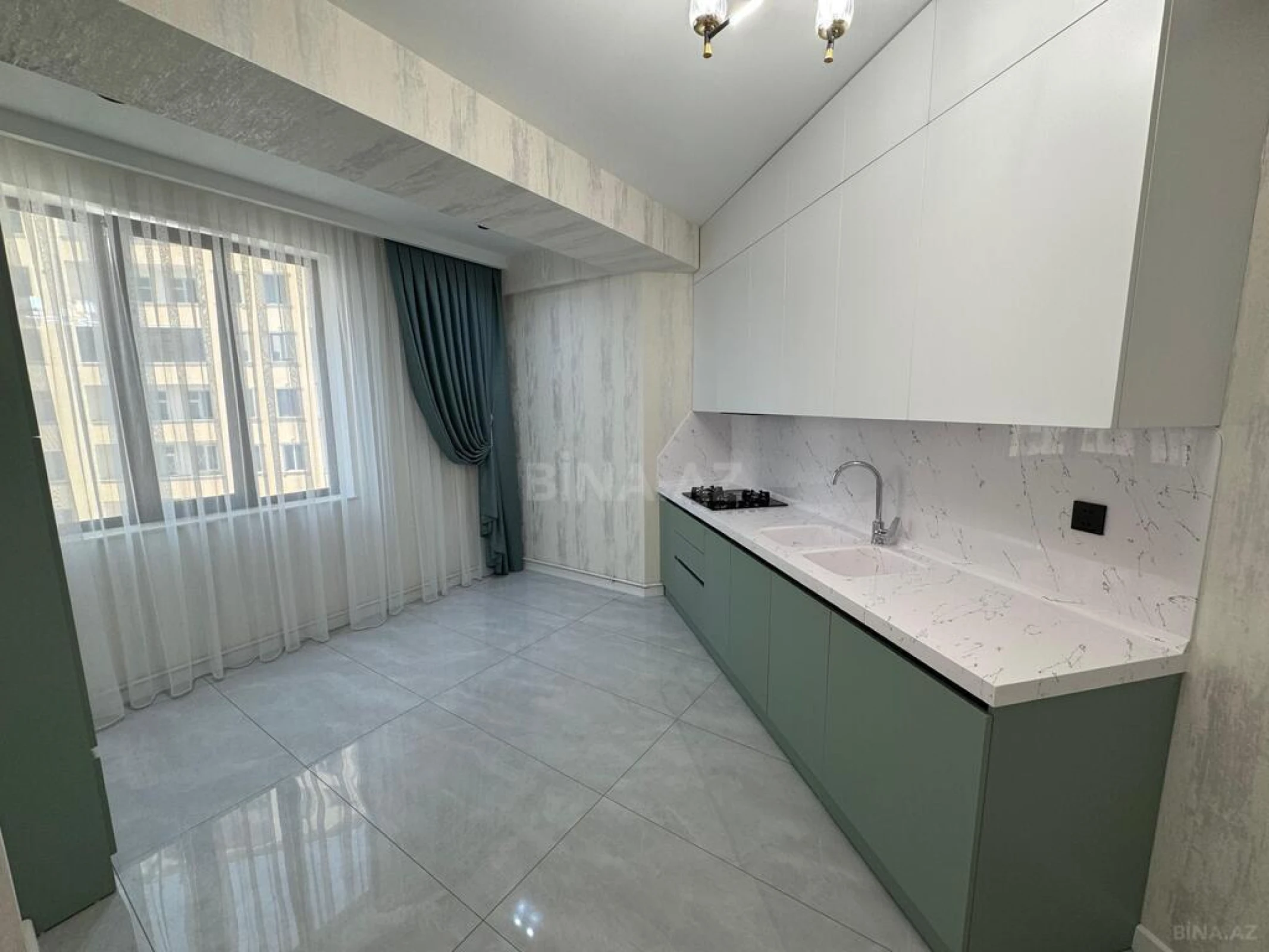 Satılır 3 otaqlı mənzil 107 m²