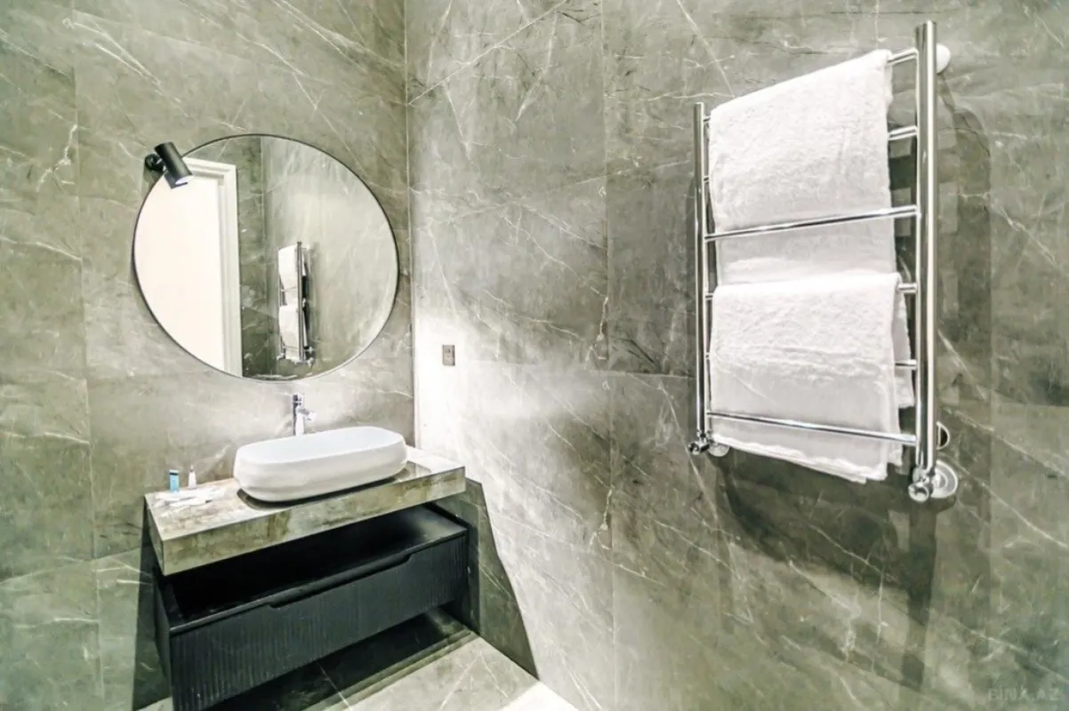 Satılır 3 otaqlı mənzil 135 m²