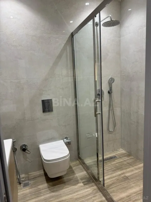 Satılır 4 otaqlı mənzil 174 m²