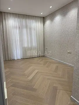 Satılır 4 otaqlı mənzil 174 m²