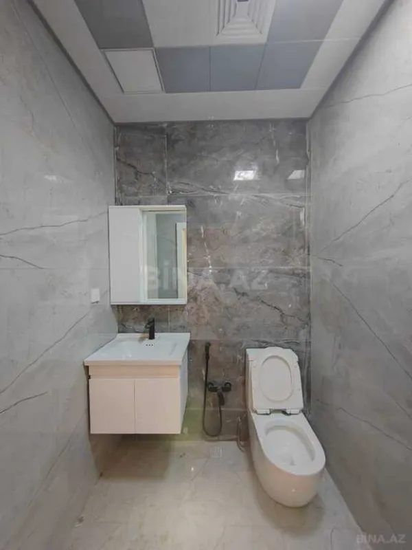Satılır 3 otaqlı mənzil 138 m²