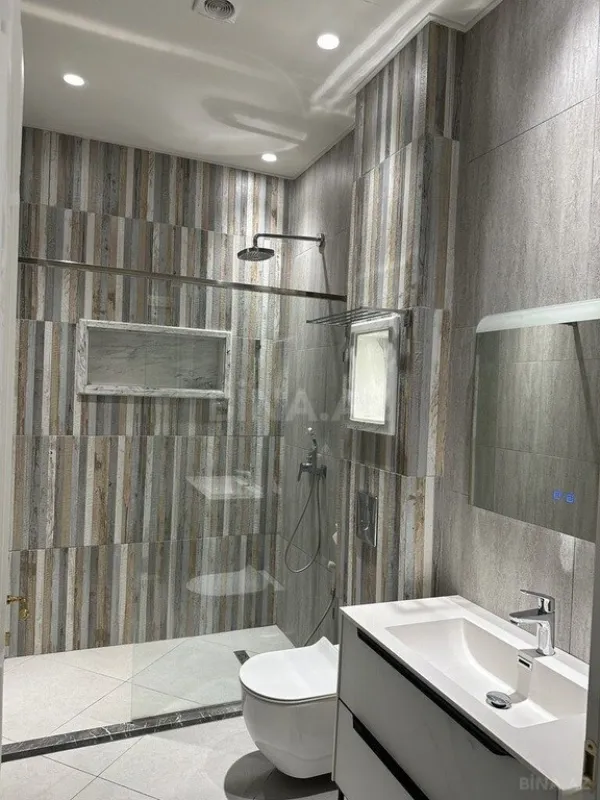 Satılır 9 otaqlı həyət evi 450 m²