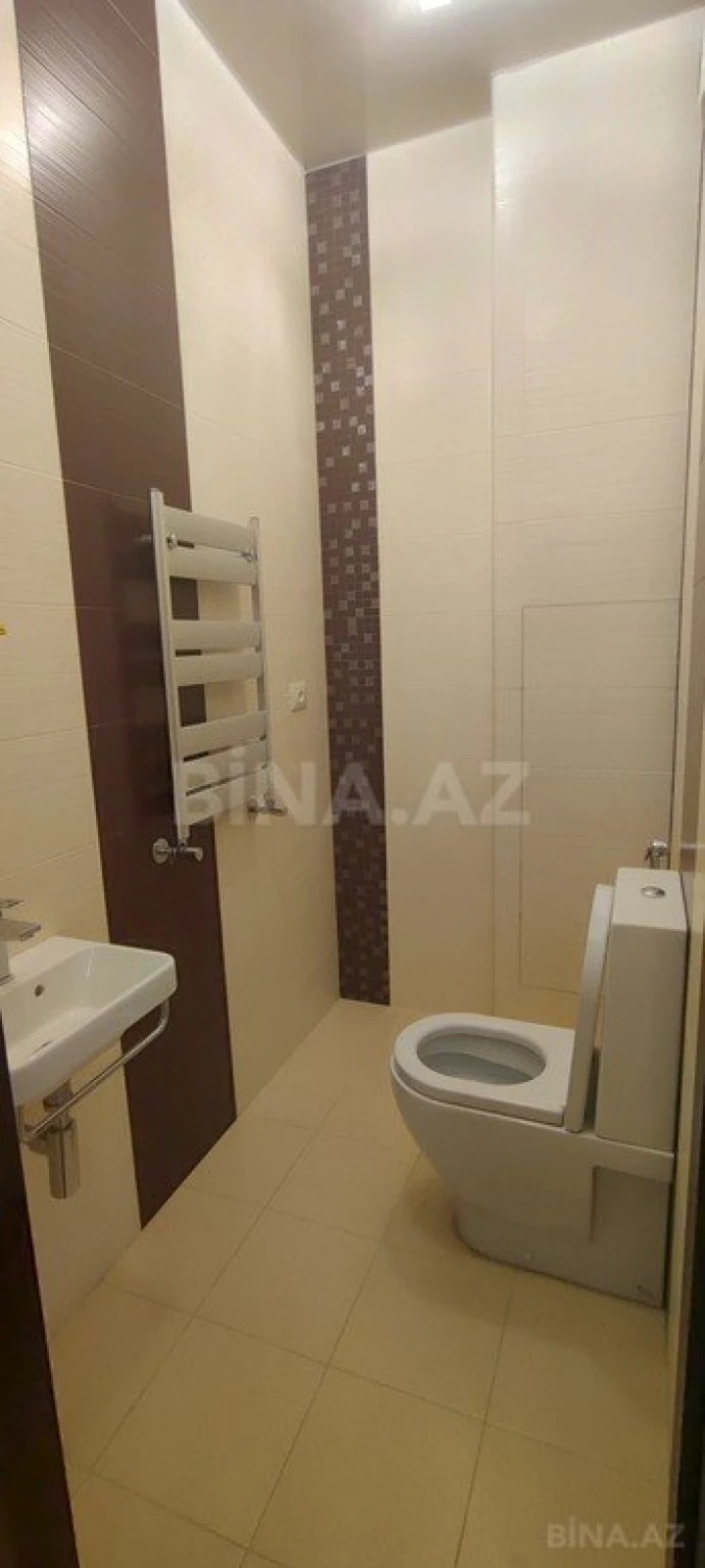 Satılır 3 otaqlı mənzil 138 m²