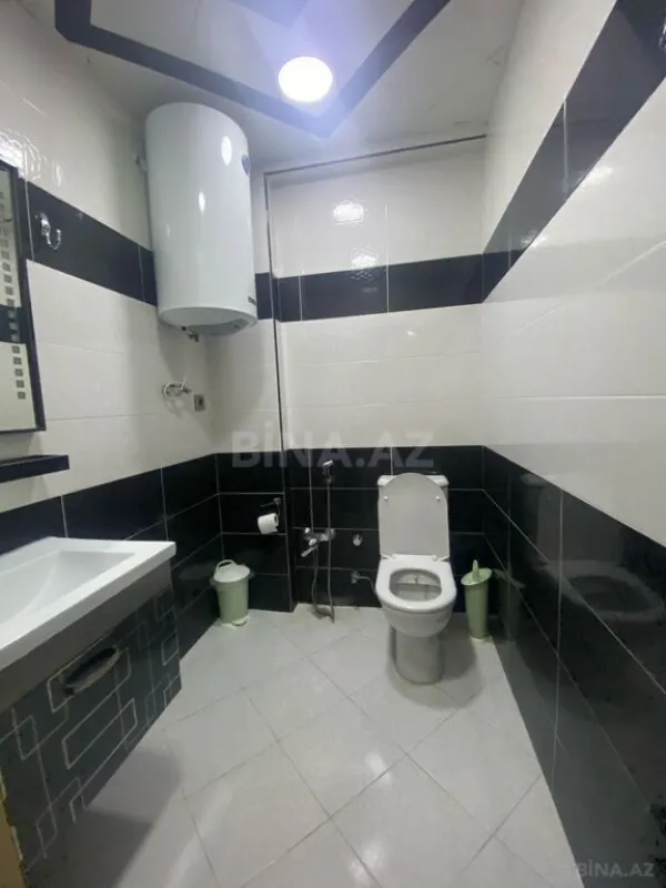 Satılır 4 otaqlı mənzil 127 m²