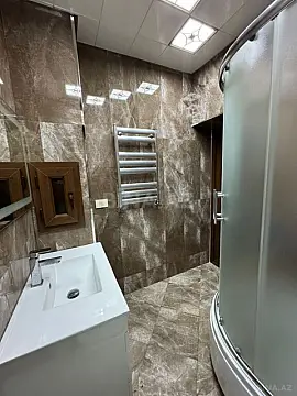 Satılır 4 otaqlı mənzil 110 m²