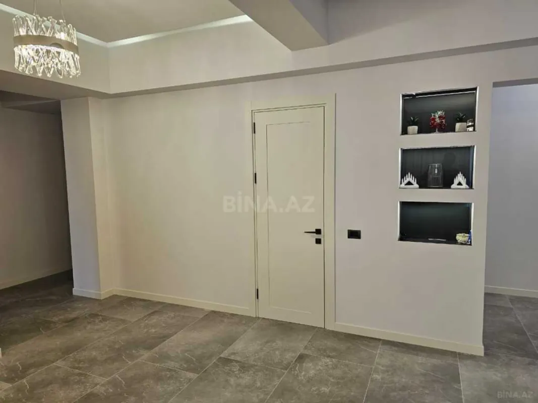 Satılır 4 otaqlı mənzil 154 m²