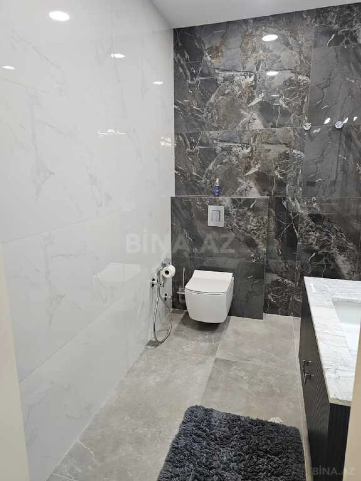 Satılır 4 otaqlı mənzil 154 m²