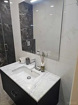 Satılır 4 otaqlı mənzil 154 m²
