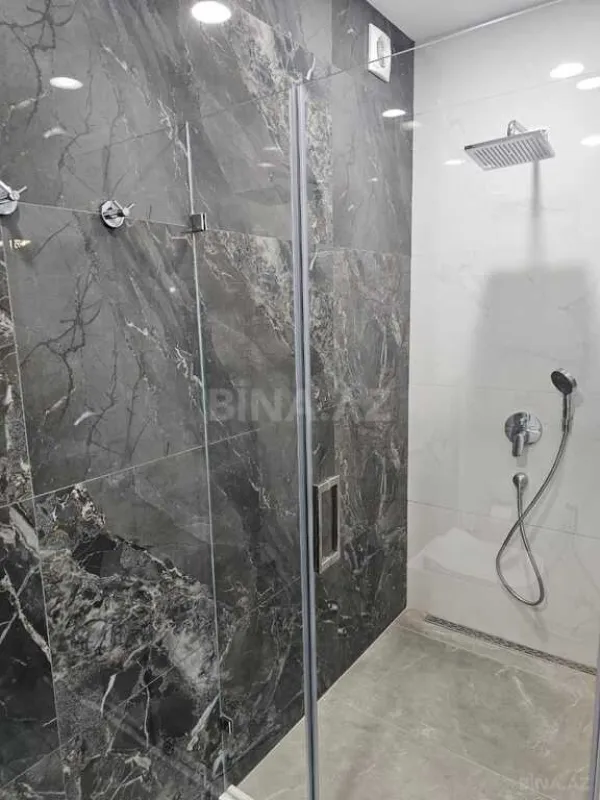 Satılır 4 otaqlı mənzil 154 m²