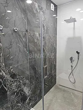 Satılır 4 otaqlı mənzil 154 m²