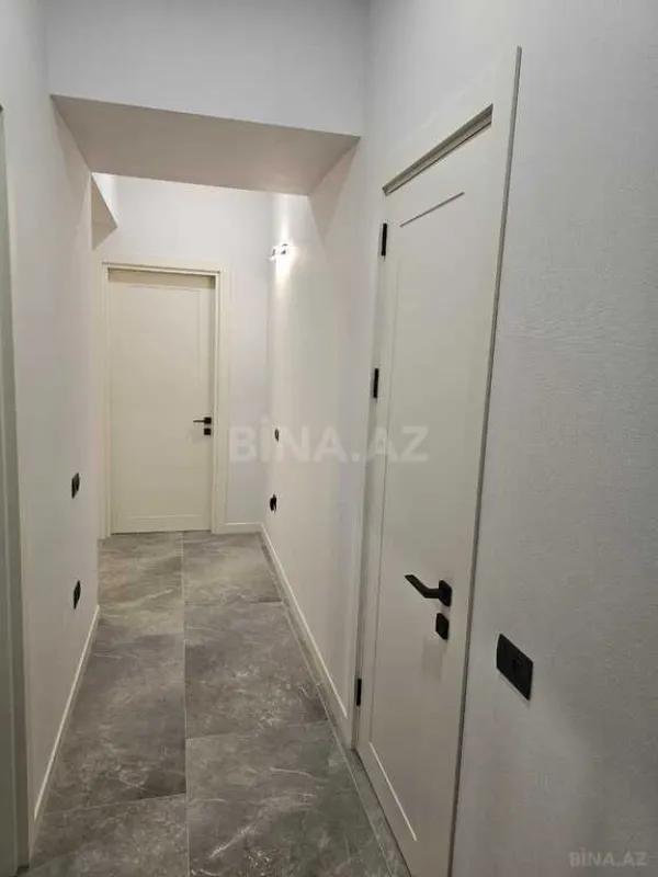 Satılır 4 otaqlı mənzil 154 m²