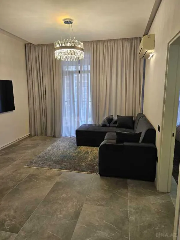 Satılır 4 otaqlı mənzil 154 m²
