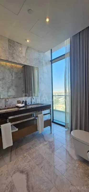 Satılır 4 otaqlı mənzil 165 m²