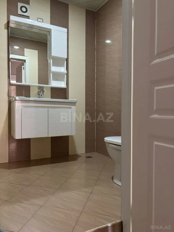 Satılır 4 otaqlı mənzil 103 m²