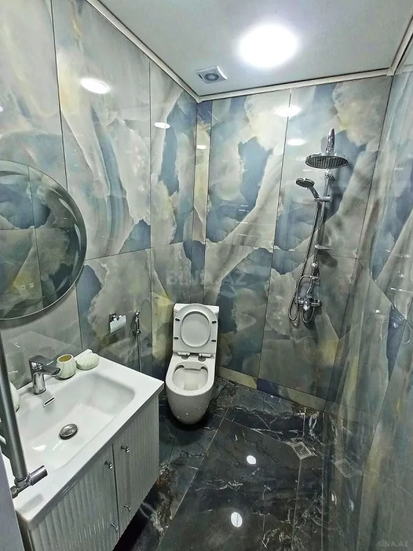 Satılır 4 otaqlı mənzil 180 m²