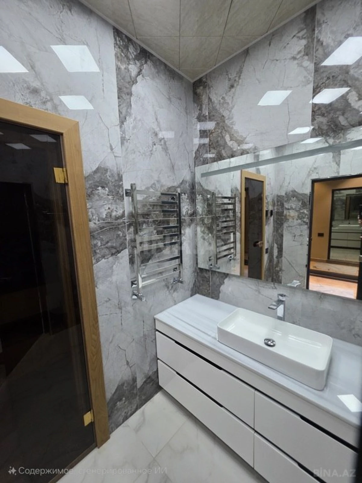 Satılır 9 otaqlı həyət evi 990 m²