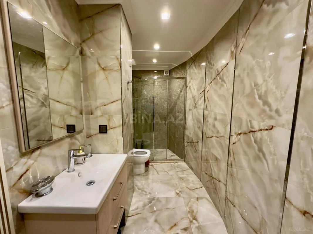 Satılır 4 otaqlı mənzil 155 m²