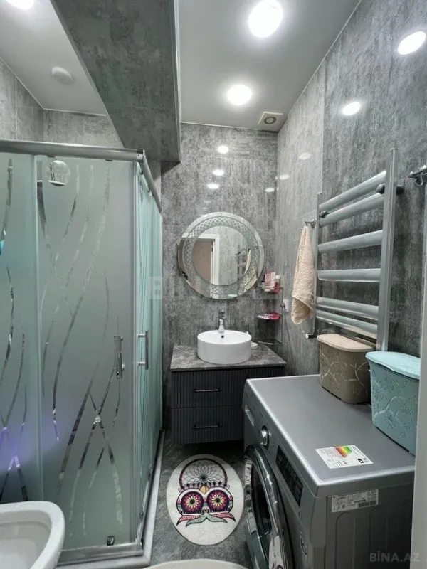 Satılır 4 otaqlı mənzil 156 m²