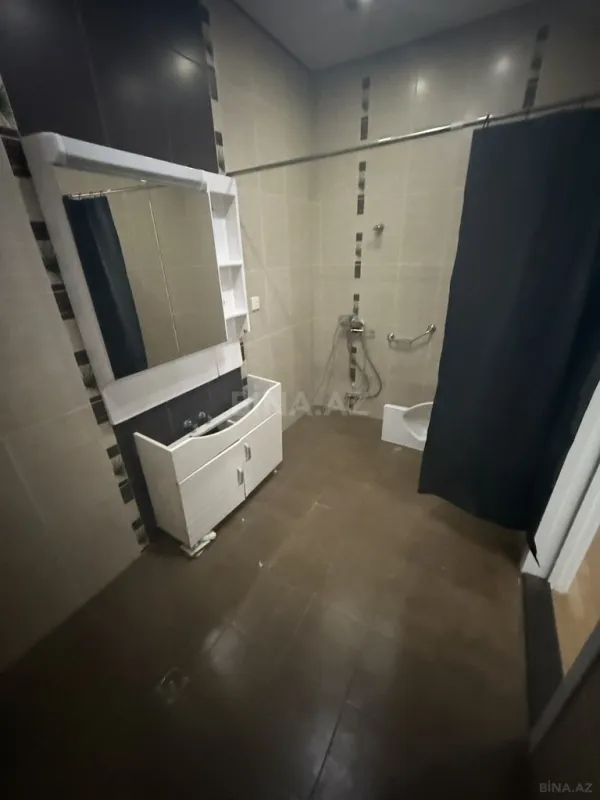 Satılır 4 otaqlı mənzil 213 m²